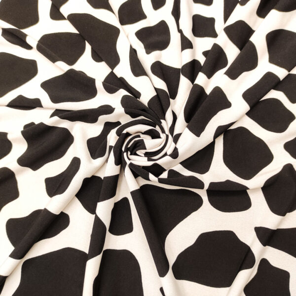 Tessuto Jersey a fantasia motivo astratto bianco - nero