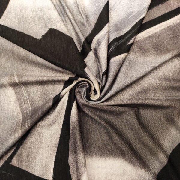 Tessuto Jersey di cotone a fantasia motivo astratto grigio - bianco - nero