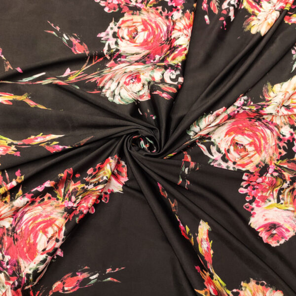 Tessuto Jersey a fantasia motivo floreale nero - fucsia - rosso