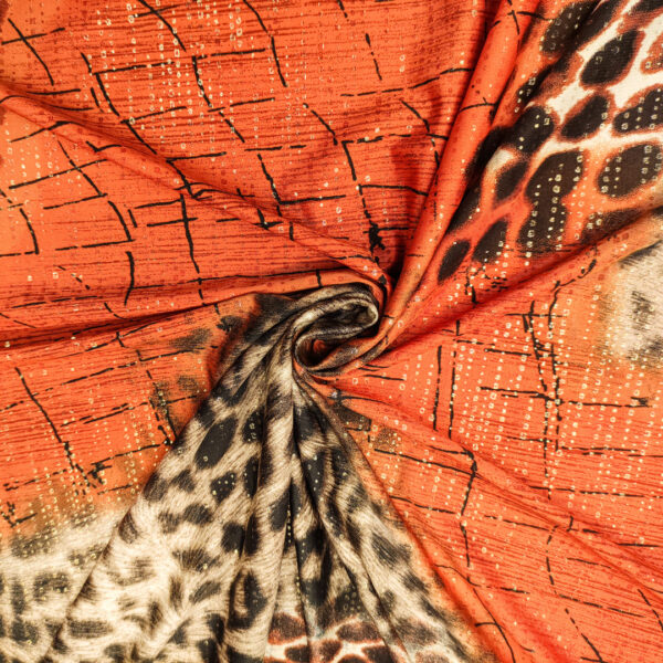 Tessuto Jersey a fantasia spalmato oro motivo animalier arancione - tortora - nero