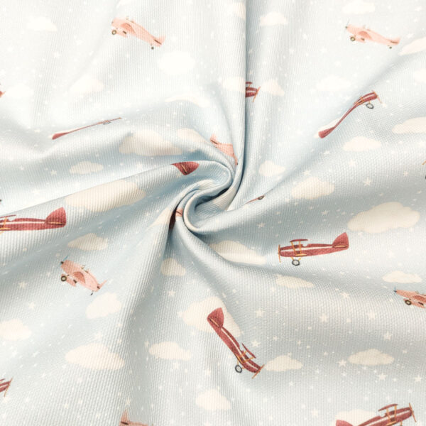 Tessuto Millerighe di Cotone a fantasia motivo aeroplano celeste - bianco - marroncino