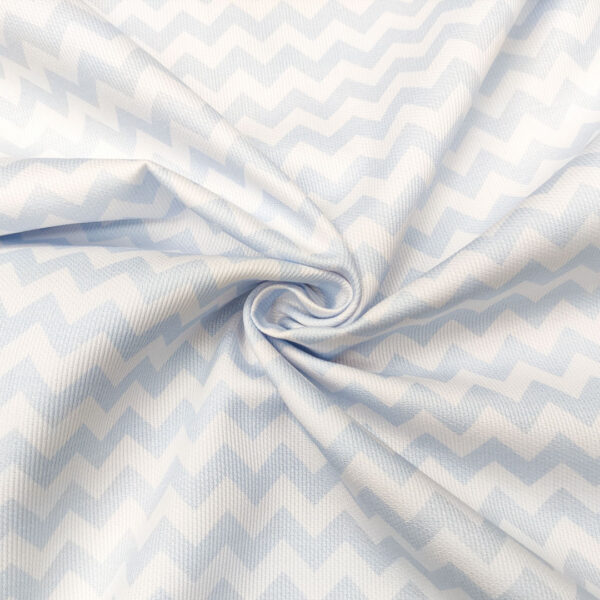 Tessuto Millerighe di Cotone a fantasia motivo geometrico bianco - celeste