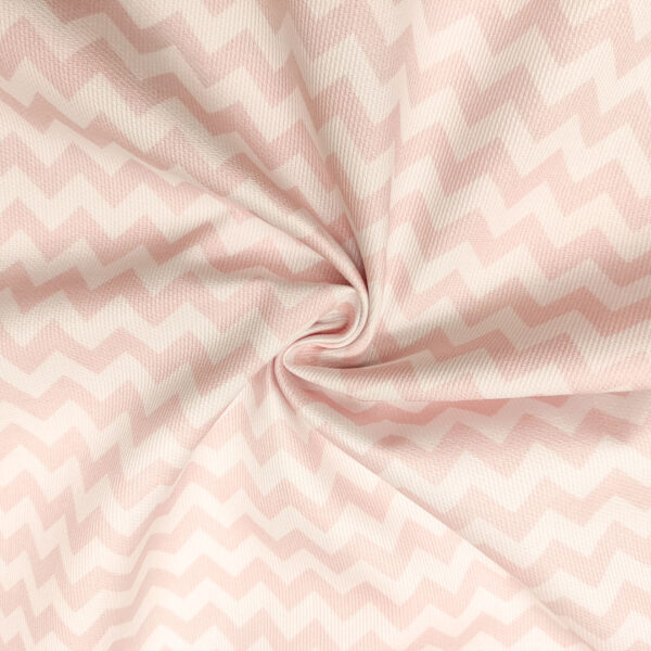 Tessuto Millerighe di Cotone a fantasia motivo geometrico bianco - rosa