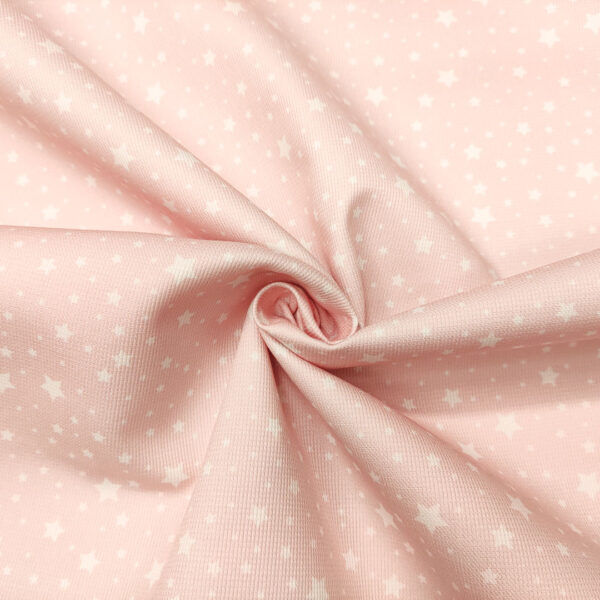 Tessuto Millerighe di Cotone a fantasia motivo stelline rosa - bianco