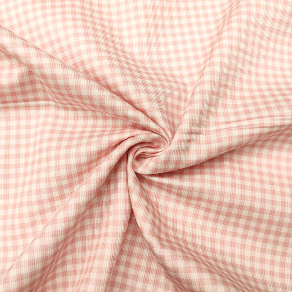 Tessuto Millerighe di Cotone a fantasia motivo quadretti bianco - rosa