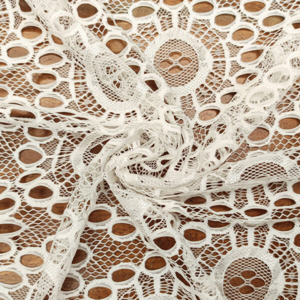 Tessuto pizzo elasticizzato motivo astratto bianco