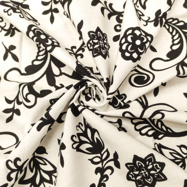 Tessuto Popeline di cotone a fantasia motivo astratto bianco - nero