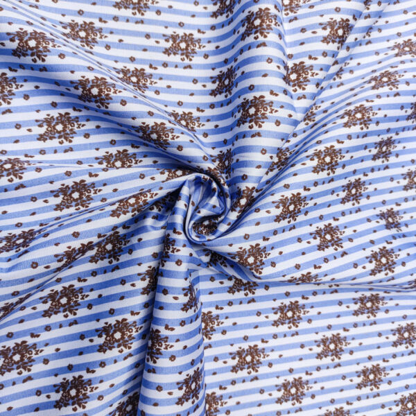 Tessuto Popeline di cotone a fantasia motivo rigato celeste - carta da zucchero - marrone