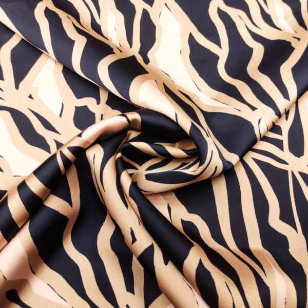 Tessuto Satin elasticizzato a fantasia motivo astratto blu - beige