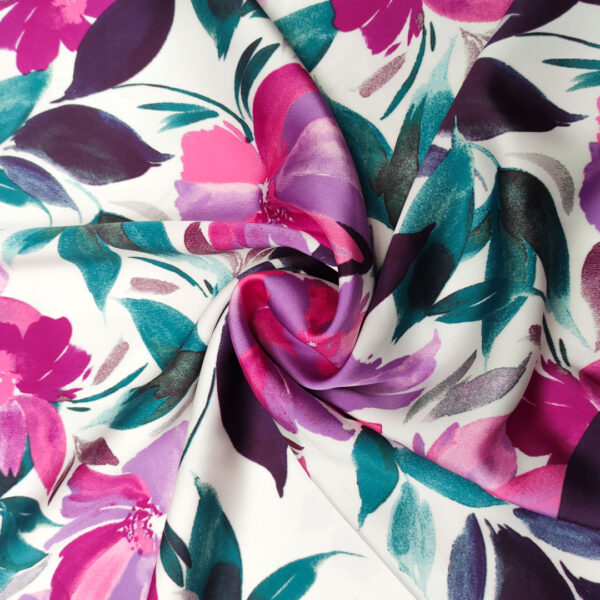 Tessuto Satin elasticizzato a fantasia motivo floreale bianco - ottanio - fucsia
