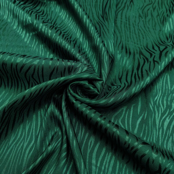 Tessuto Satin leggero elasticizzato jacquard motivo animalier verde bottiglia