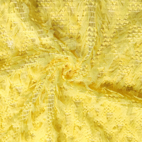 Tessuto Tulle ricamato con frange tinta unita giallo