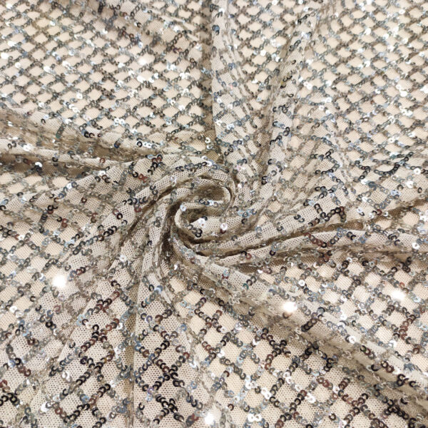 Tessuto Tulle Elasticizzato Ricamato con paillettes motivo geometrico argento
