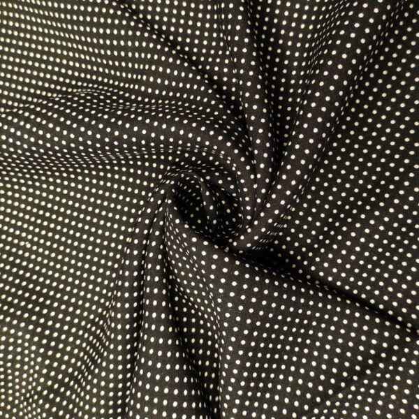 Tessuto Viscosa a fantasia motivo pois bianco - nero