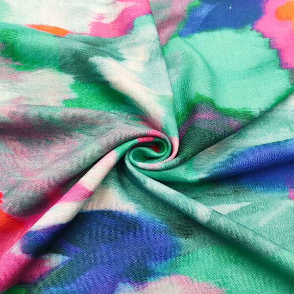 Tessuto Viscosa e lino a fantasia motivo astratto smeraldo - blu elettrico - fucsia