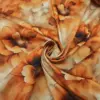 Tessuto Rasatello di cotone arancione beige coccio motivo floreale iaiatessuti