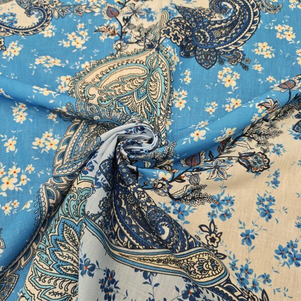 Tessuto Crepe effetto lino a fantasia motivo floreale cashmere panna - turchese - blu