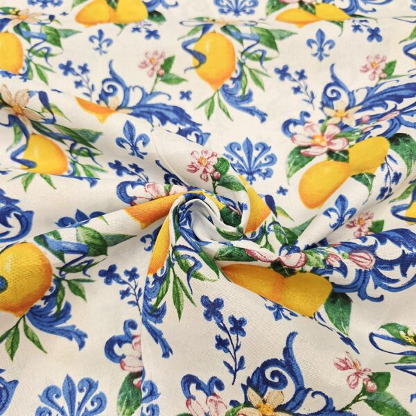 Tessuto Misto Cotone per arredo a fantasia motivo limoni bianco - giallo - azzurro