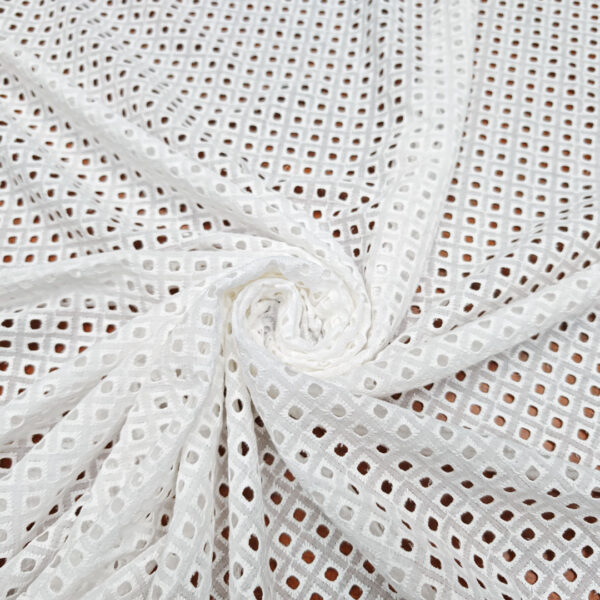 Tessuto Sangallo motivo geometrico bianco naturale