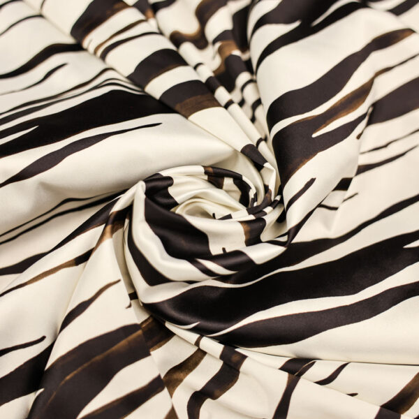Tessuto Satin a fantasia motivo animalier bianco - nero - marrone