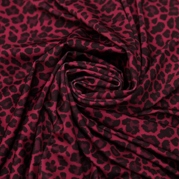 Tessuto Lycra a fantasia motivo animalier azalea - nero