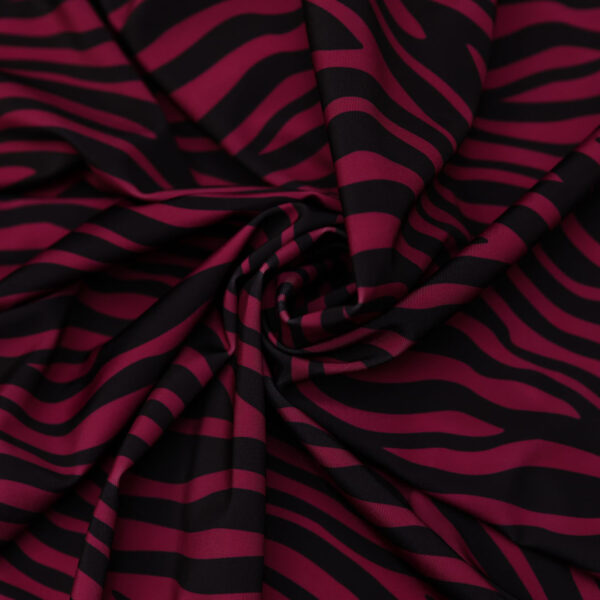 Tessuto Lycra a fantasia motivo animalier nero - azalea