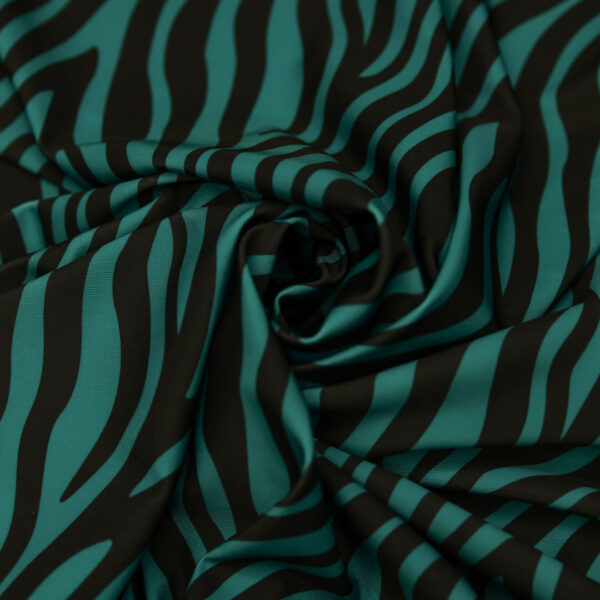 Tessuto Lycra a fantasia motivo animalier verde ottanio - nero