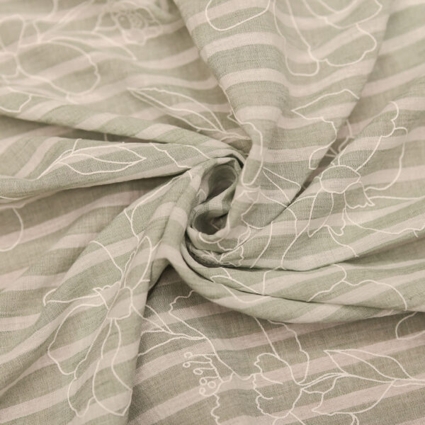 Tessuto Crepe effetto lino ricamato motivo floreale bianco - verde salvia