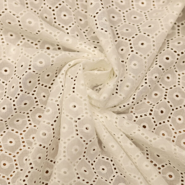 Tessuto Sangallo motivo geometrico bianco naturale