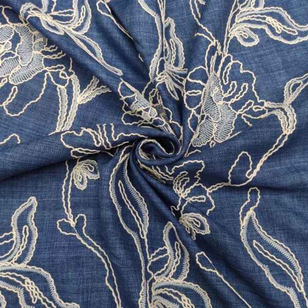Tessuto Cady Elasticizzato effetto melange Ricamato motivo floreale  blu navy avorio