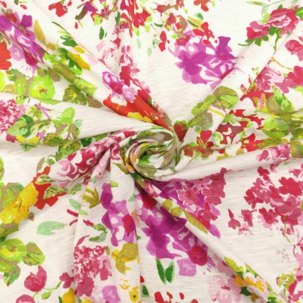 Tessuto Jersey di cotone a fantasia motivo floreale bianco fucsia rosso giallo