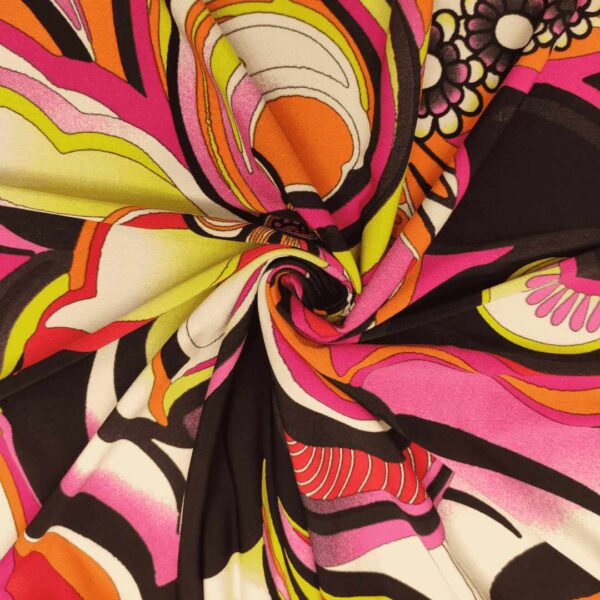 Tessuto Jersey a fantasia motivo astratto fucsia lime nero