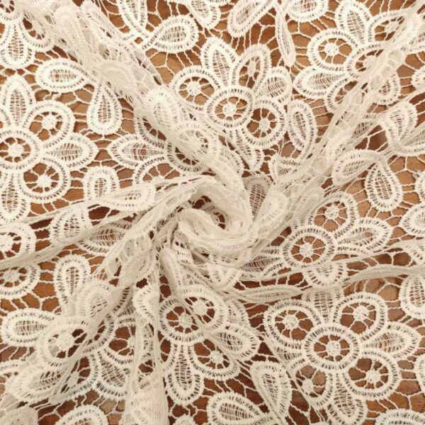 Tessuto Pizzo macramè motivo geometrico bianco