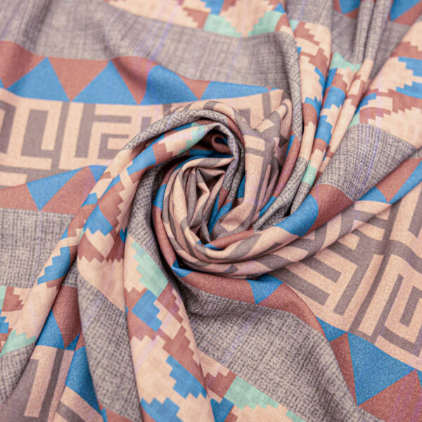 Tessuto Crepe elasticizzato a fantasia motivo astratto grigio rosa azzurro