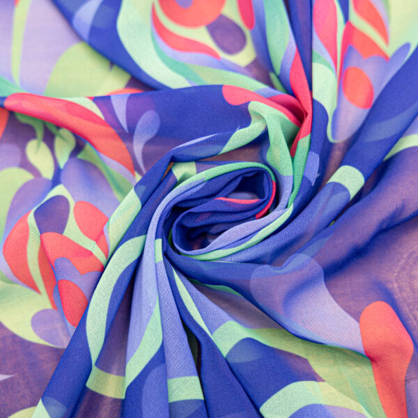 Tessuto Georgette a fantasia motivo  astratto verde fucsia bluette