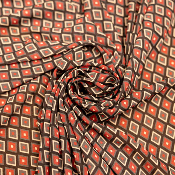Tessuto Georgette a fantasia motivo  geometrico nero bordeaux grigio