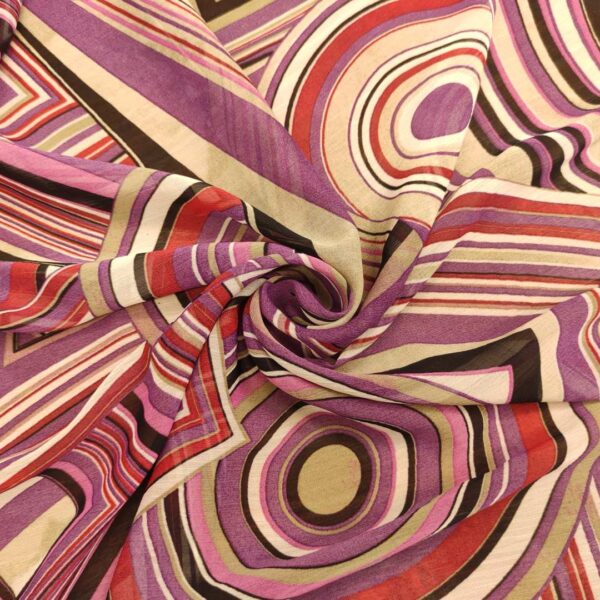 Tessuto Georgette a fantasia motivo geometrico viola fucsia nero