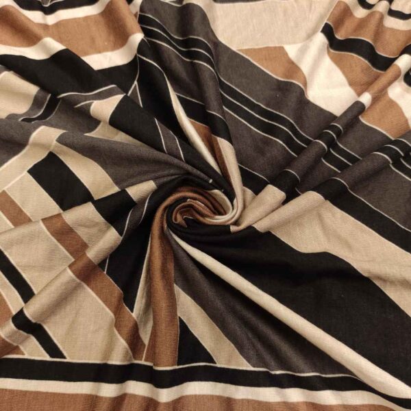 Tessuto Jersey di cotone a fantasia motivo astratto nocciola nero bianco