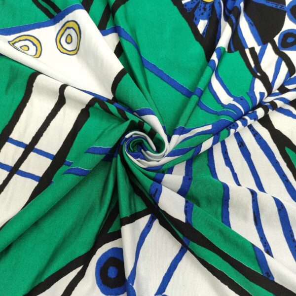 Tessuto Jersey di viscosa a fantasia motivo astratto verde blu bianco