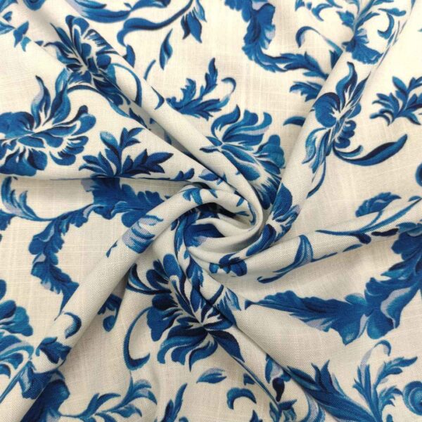 Tessuto Misto Lino a fantasia motivo floreale bianco bluette